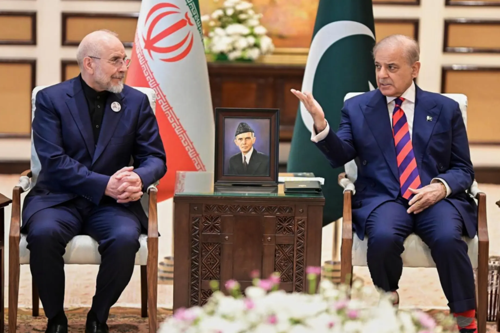 Iran’s Parliament Speaker Mohammad Bagher Ghalibaf, left, meets with hand with Pakistani Prime Minister Shehbaz Sharif, in Islamabad, Pakistan, Saturday, April 11, 2026. (Pakistan Prime Minister Office)